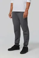 Pantaloni unisex Proact Adult Multisport Jogging Pants With Pockets personalizați, pe model