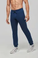 Pantaloni unisex Proact Adult Multisport Jogging Pants With Pockets personalizați, pe model