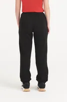 Pantaloni copii Just Hoods Cuffed Jogpants personalizați, pe model