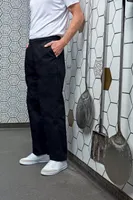 Pantaloni unisex Premier Essential Chef S Trousers personalizați, pe model