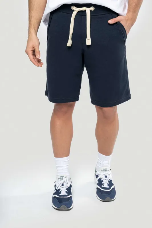 Pantaloni scurți unisex Kariban French Terry Bermuda Shorts personalizați, pe model