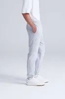 Pantaloni unisex Just Hoods College Cuffed Jogpants personalizați, pe model