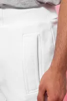 Pantaloni unisex Kariban Jogging Bottoms personalizați, pe model