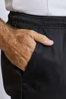 Pantaloni unisex Premier Essential Chef S Trousers personalizați, pe model
