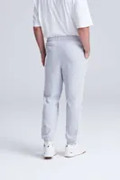 Pantaloni unisex Just Hoods College Cuffed Jogpants personalizați, pe model