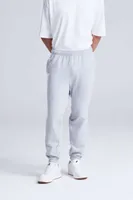 Pantaloni unisex Just Hoods College Cuffed Jogpants personalizați, pe model