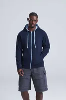 Bluză unisex Just Hoods Varsity Zoodie personalizată, pe model