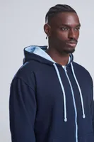 Bluză unisex Just Hoods Varsity Zoodie personalizată, pe model