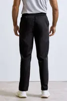 Pantaloni unisex Premier Essential Chef S Trousers personalizați, pe model