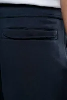 Pantaloni scurți unisex Kariban French Terry Bermuda Shorts personalizați, pe model