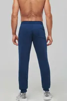 Pantaloni unisex Proact Adult Multisport Jogging Pants With Pockets personalizați, pe model