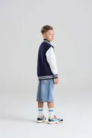 Jachetă copii Just Hoods Varsity personalizată, pe model