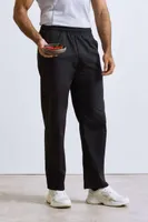 Pantaloni unisex Premier Essential Chef S Trousers personalizați, pe model