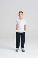 Pantaloni copii Just Hoods Cuffed Jogpants personalizați, pe model