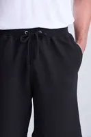 Pantaloni scurți unisex Just Hoods Campus Shorts personalizați, pe model