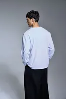 Tricou cu mânecă lungă unisex Anthem Headline Heavy personalizat, pe model