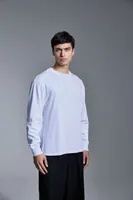 Tricou cu mânecă lungă unisex Anthem Headline Heavy personalizat, pe model
