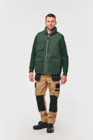Vestă unisex Designed To Work Quilted Bodywarmer personalizată, pe model