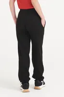 Pantaloni copii Just Hoods Cuffed Jogpants personalizați, pe model